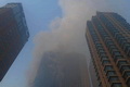 Hotel in NE China engulfed in fire, caused by fireworks