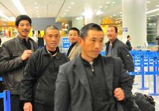 Evacuated workers arrive in Shanghai