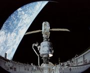 Shuttle's first international space station trek