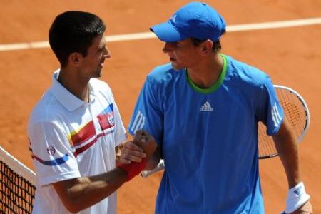Djokovic, Federer grab opening wins at French Open