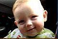 Baby falls asleep while smiling
