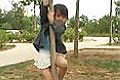 Little girl shows off her pole dancing skills