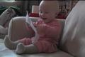 Baby laughs like crazy at ripping paper