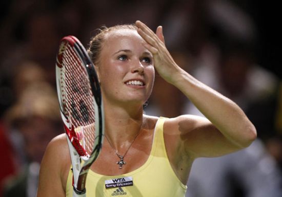 Wozniacki, Kvitova start with wins at WTA finals