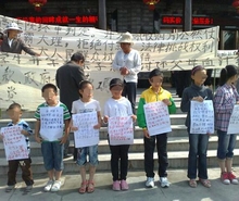 Children in unpaid wages fight