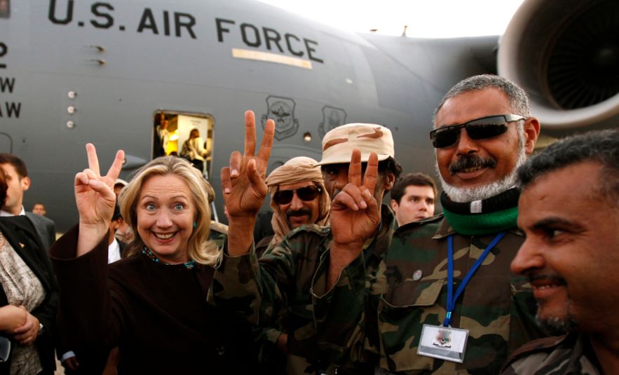 Posing with Libyan soldiers